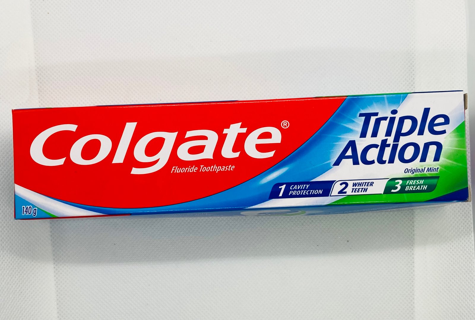 Pasta de dente Colgate Triple Action 140g 